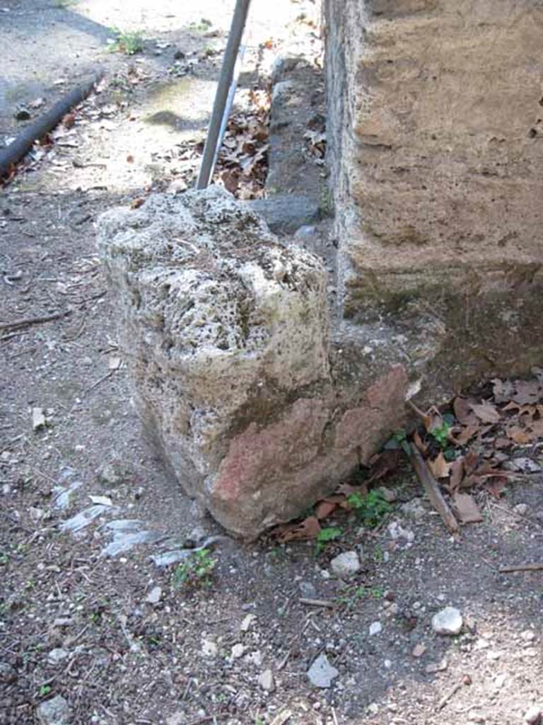 Pompeii. Street altar near I.1.10, looking west. September 2010. Photo courtesy of Drew Baker. According to Sogliano, on the south-east corner of the insula was a small masonry altar. The altar was covered with red stucco, and the wall behind was also painted. On this wall were two very large serpents crawling between plants, one on each side of the corner of the insula. Today, there is no visible trace, other than the red stucco at the base of the altar, above. See Sogliano, A., 1879. Le pitture murali campane scoverte negli anni 1867-79. Napoli: (p.9)
