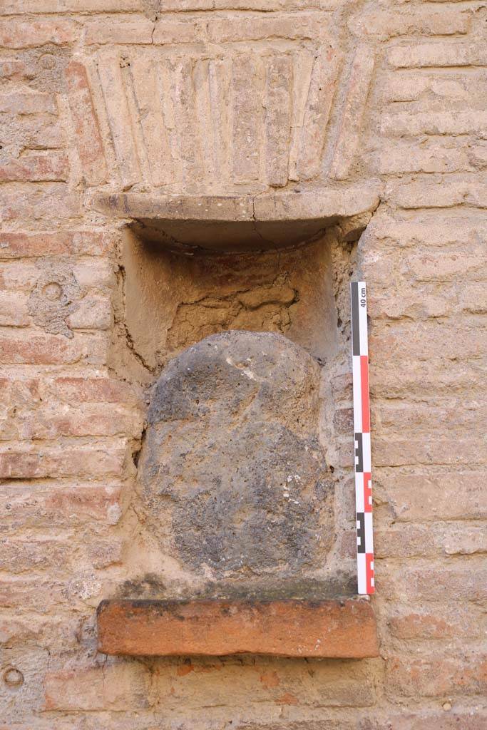 Street altar outside I.12.5, Pompeii. December 2018. Looking south. Photo courtesy of Aude Durand.