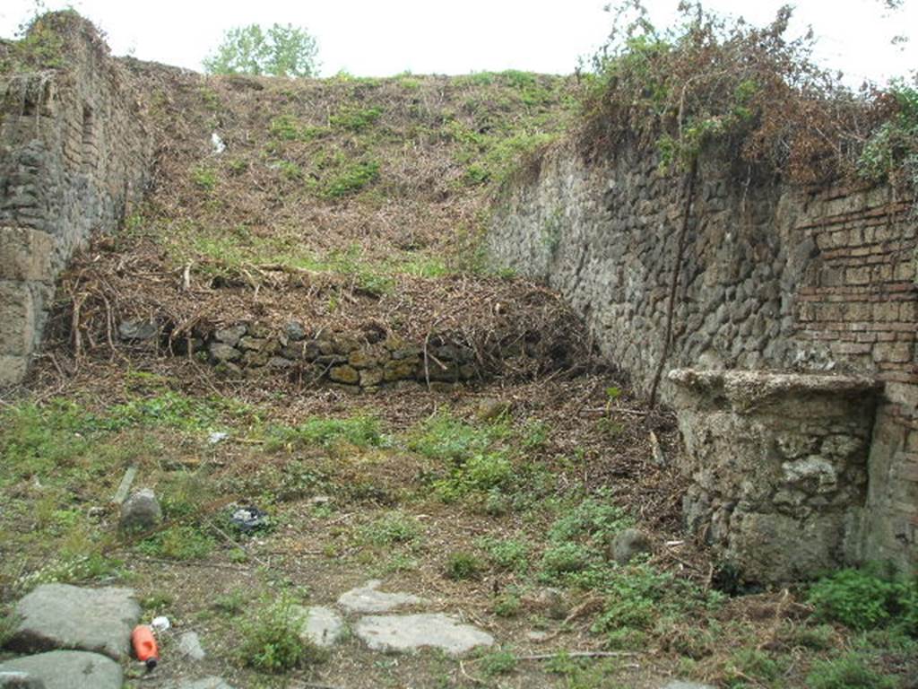 III.11 Pompeii. Blocked roadway and street altar on north-east corner of III.10.6, on right.