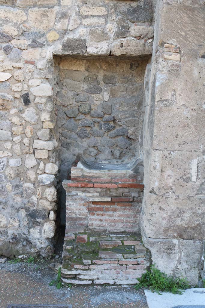 Outside VIII.2.11 Pompeii. December 2018.  
Street altar at corner of Via delle Scuole. Photo courtesy of Aude Durand.
