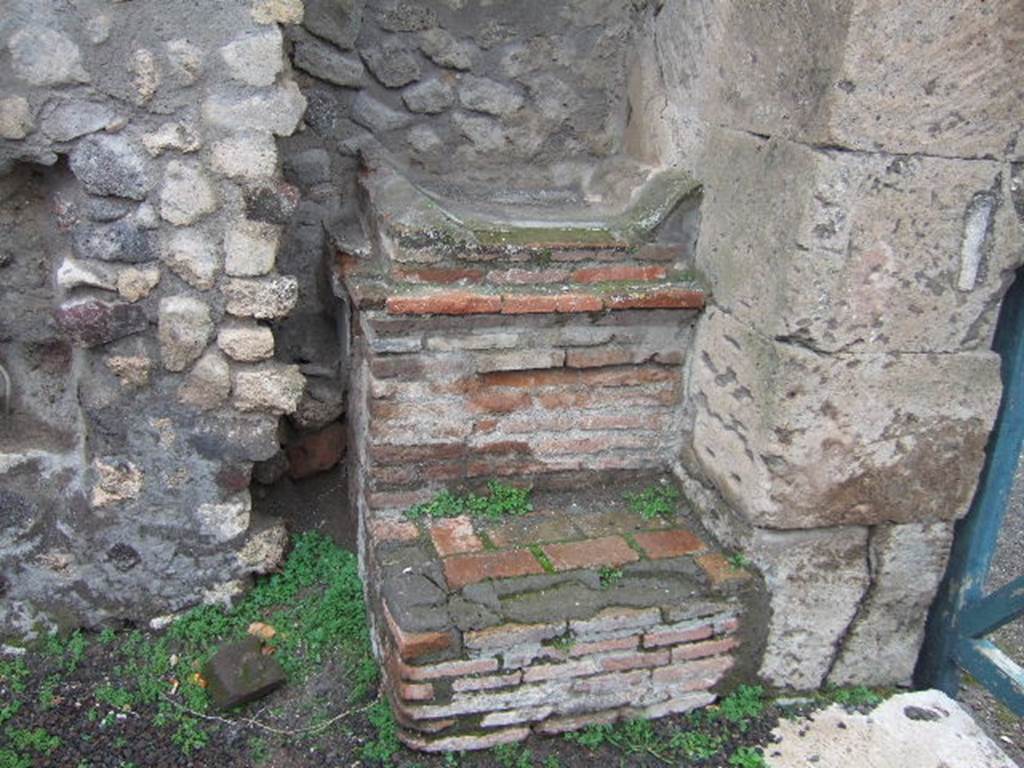 Outside VIII.2.11, Pompeii. Street altar on west side of Via delle Scuole.