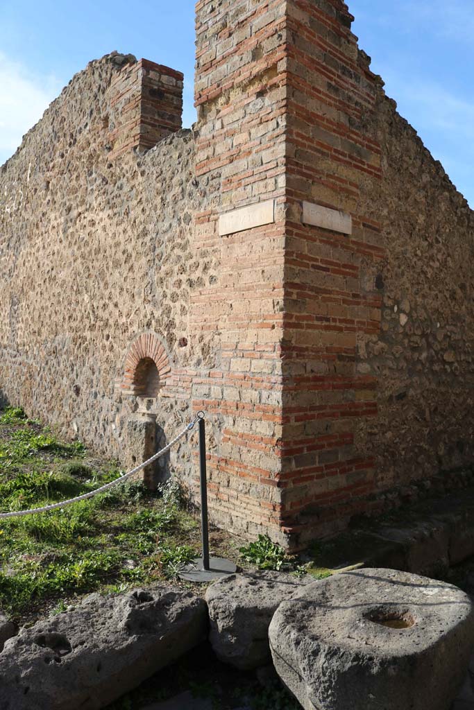 Vicolo di Tesmo Pompeii on right. December 2018. 
Looking north-west towards IX.4, and street shrine at junction. Photo courtesy of Aude Durand.

