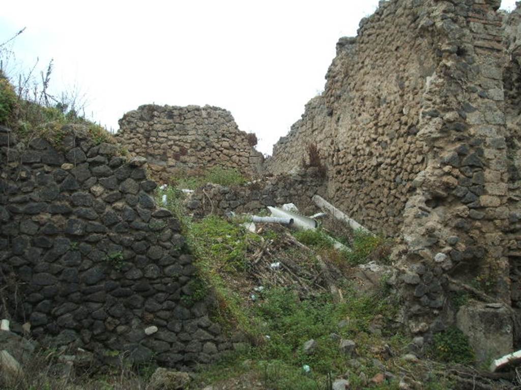 IX.8.8 Pompeii.  March 2009.  Street Altar on north side of entrance doorway, on right.