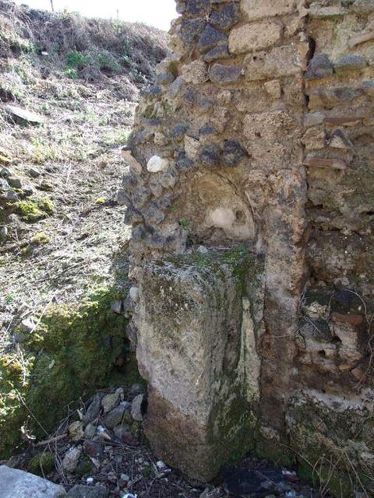 IX.8.8 Pompeii.  March 2009.  Street altar on north side of entrance doorway.