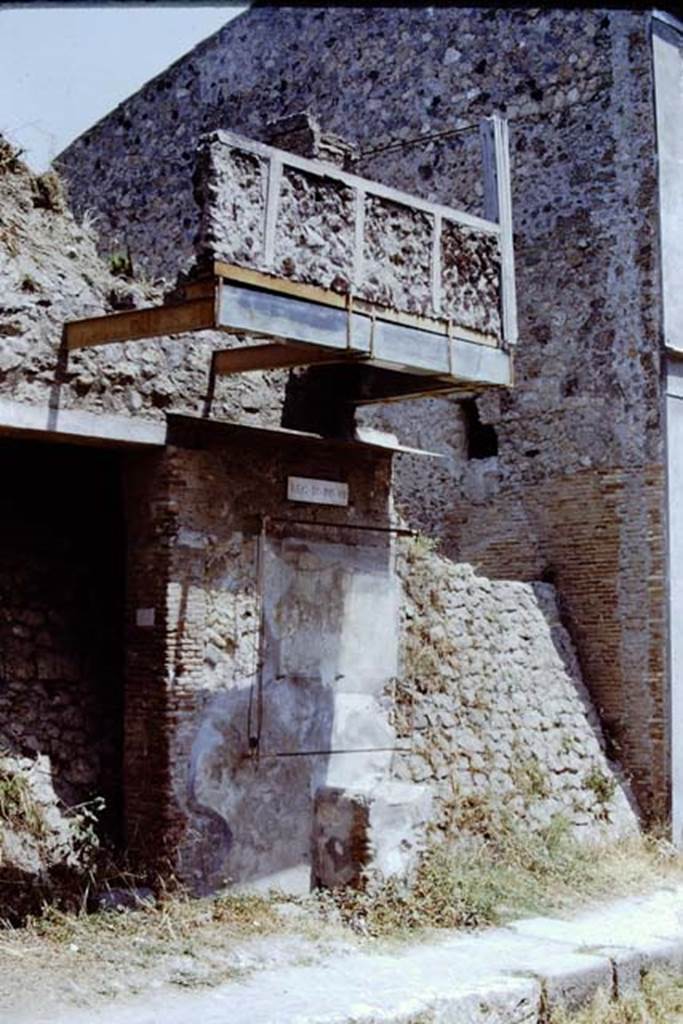 Street altar outside IX.12.7 Pompeii. 1971. Looking north-east on Via dellAbbondanza.  
Photo by Stanley A. Jashemski.
Source: The Wilhelmina and Stanley A. Jashemski archive in the University of Maryland Library, Special Collections (See collection page) and made available under the Creative Commons Attribution-Non Commercial License v.4. See Licence and use details.
J71f0154
