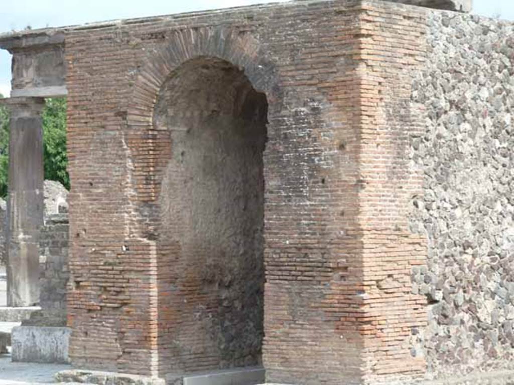 Arched monument at south end of Forum. May 2010. North side.