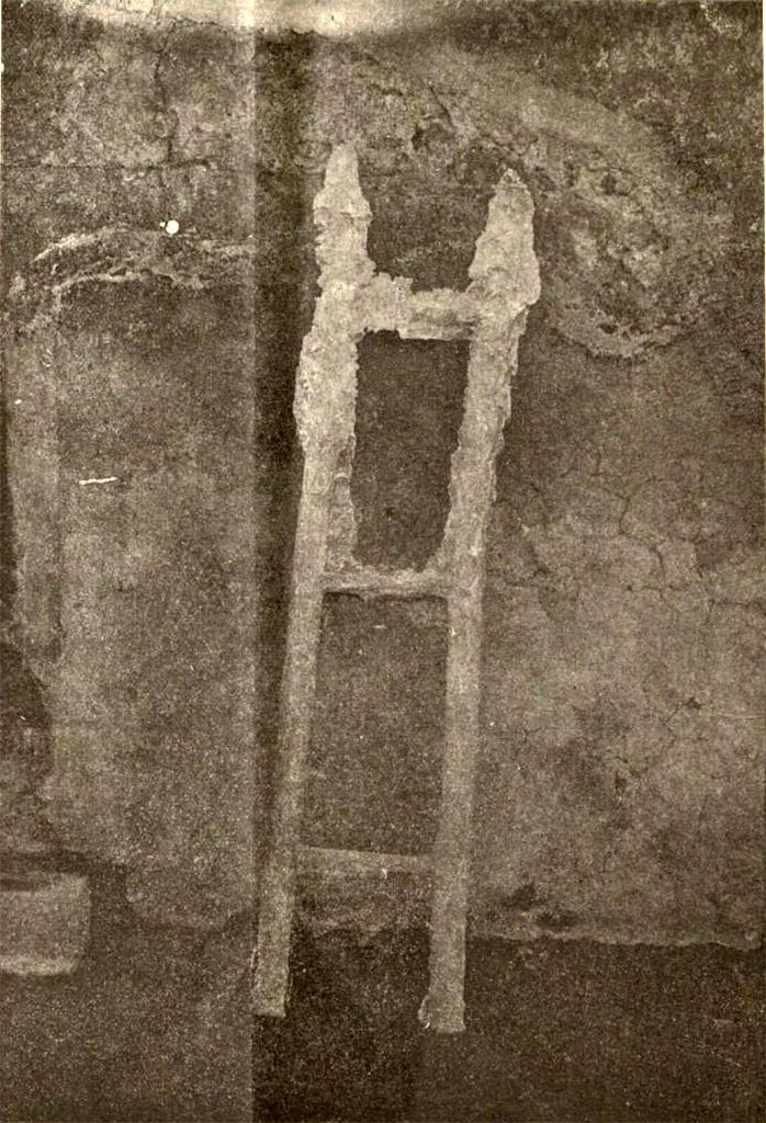 V.3.12 Pompeii. Upon excavating the andron in December 1902 the following plaster casts were made. 
- an internal fascia of the entrance doorway 
- a bar of wood with which one reinforced the doorway when it was closed
- a ladder (shown in the photo above). 
According to Sogliano, it must be recorded that the ladder was the first of its type to be cast. 
Sogliano said this was due to the diligence of Della Corte.
See Notizie degli Scavi di Antichità, 1905, p. 214 fig. 5.

