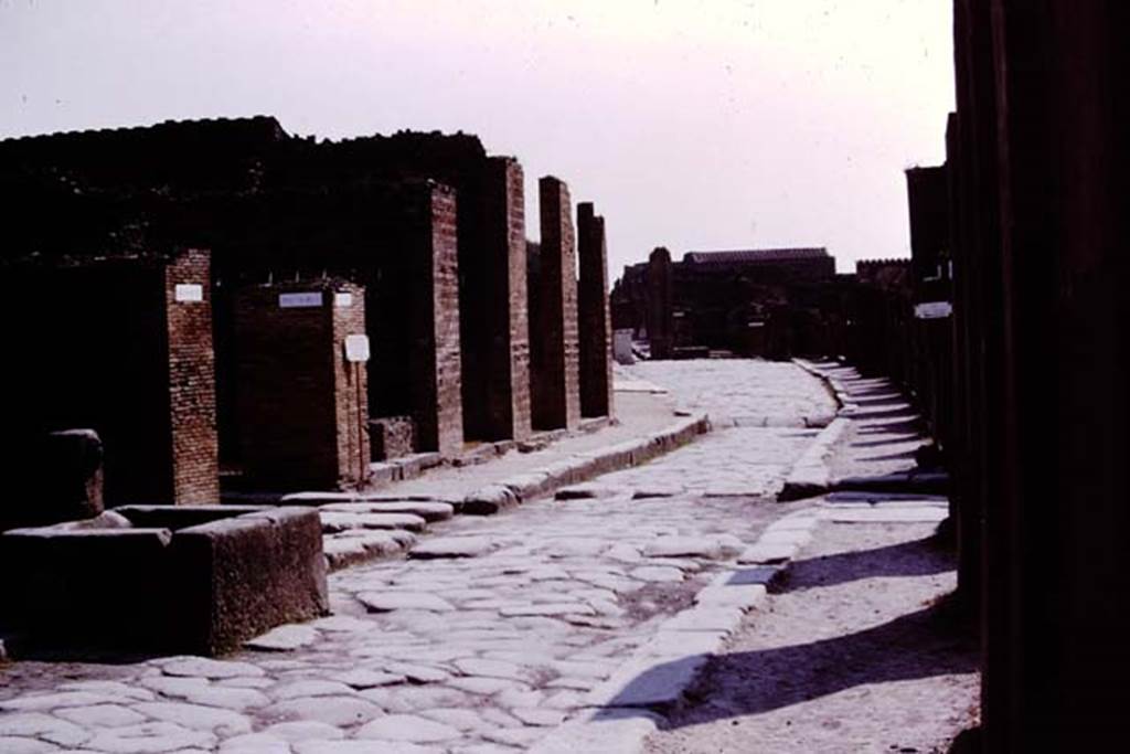 Fountain outside VII.14.13 and VII.14.14 on Via dellAbbondanza, Pompeii. 1975. Looking east. Photo by Stanley A. Jashemski.   
Source: The Wilhelmina and Stanley A. Jashemski archive in the University of Maryland Library, Special Collections (See collection page) and made available under the Creative Commons Attribution-Non Commercial License v.4. See Licence and use details.
J75f0372

