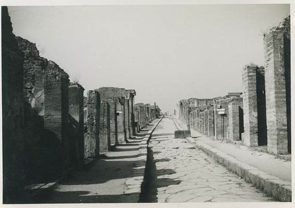 Fountain outside VII.14.13 and VII.14.14 on Via dell Abbondanza. 1956. Looking west between VIII.4 and VII.1. Photo courtesy of Rick Bauer.