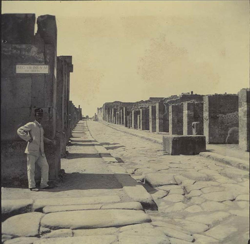 Fountain outside VII.14.13 and VII.14.14 on Via dell Abbondanza. November 1899. Looking west between VIII.5 and VII.14, from the junction with Via dei Teatri. Photo courtesy of Rick Bauer.
