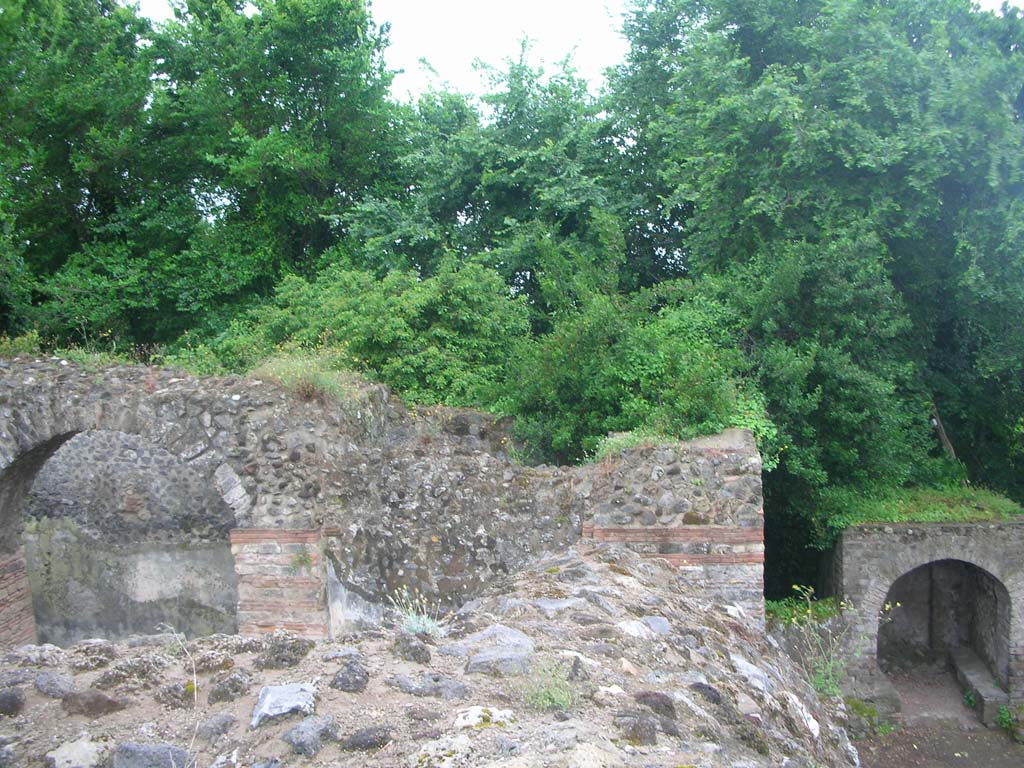 Porta Ercolano or Herculaneum Gate, Pompeii. May 2010. 
Looking west across top of Herculaneum Gate at north end. Photo courtesy of Ivo van der Graaff.
