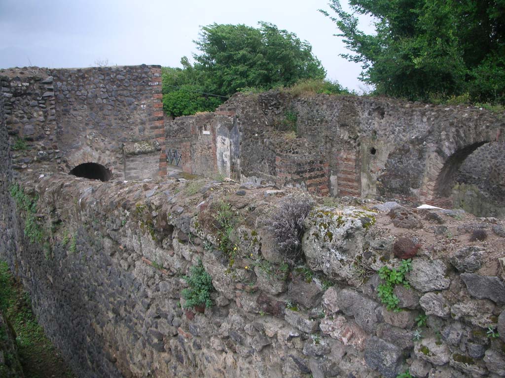 Porta Ercolano or Herculaneum Gate, Pompeii. May 2010. 
Looking south-west from top of wall, across Herculaneum Gate. Photo courtesy of Ivo van der Graaff.
