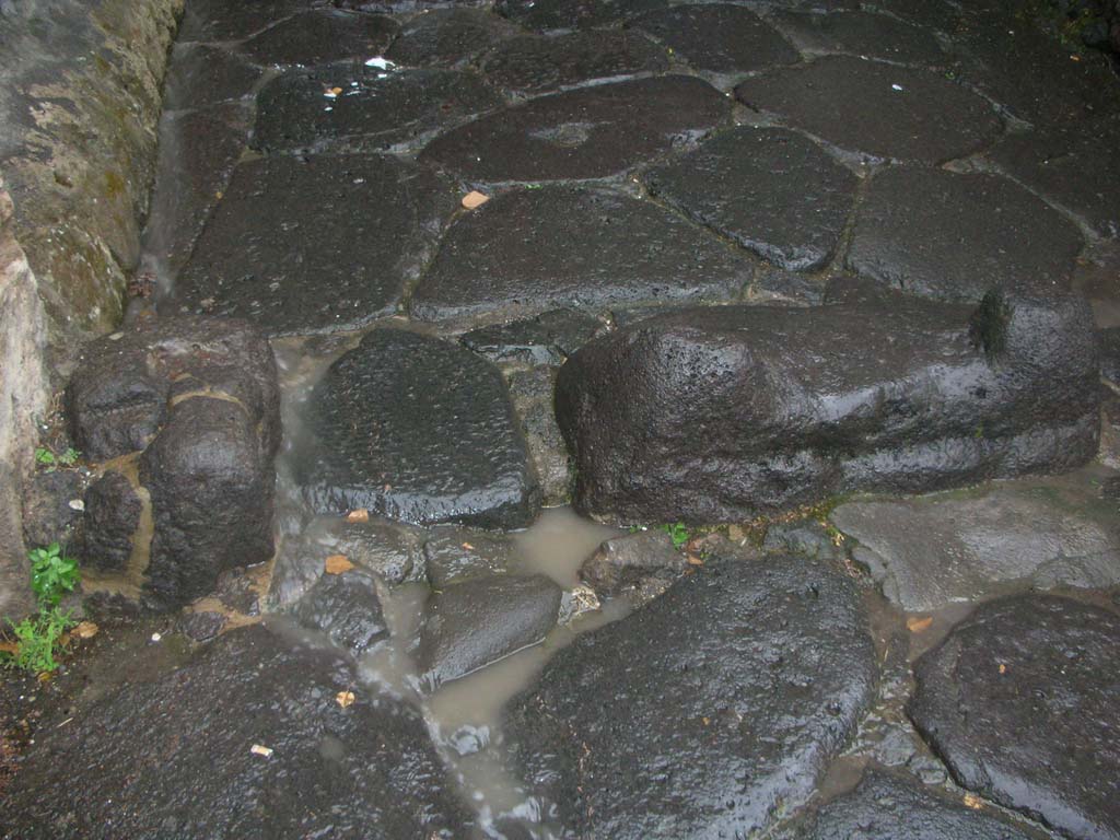 Porta Marina, Pompeii. May 2011. 
Looking towards lava blocks on north side of wider tunnel of gate. Photo courtesy of Ivo van der Graaff.



