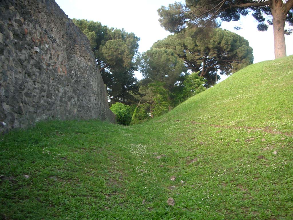 Porta di Nocera or Nuceria Gate, Pompeii. May 2010. 
Looking along north side of agger from east side of north end of gate. Photo courtesy of Ivo van der Graaff.
