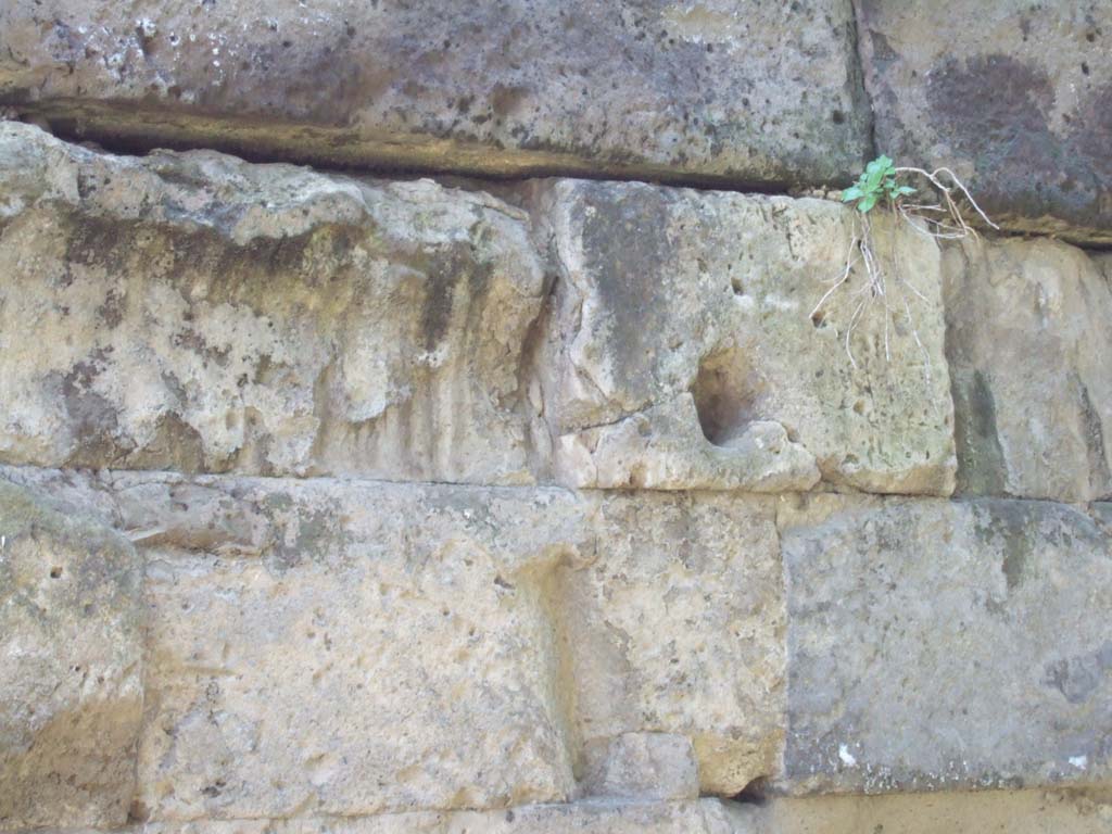 Vesuvian Gate Pompeii. May 2006. Wall to left of Tower X showing impact by war machines used by Sulla. 