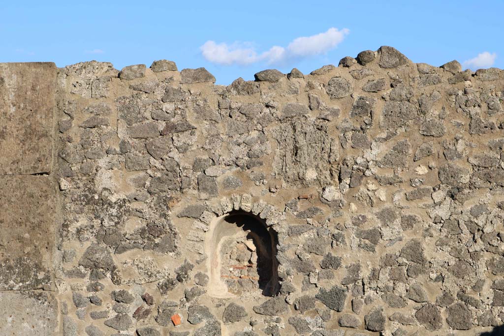 VIII.5.1 Pompeii. December 2018. Niche in east wall of shop-room. Photo courtesy of Aude Durand.
According to Boyce –
In the east wall is an arched niche (h.0.45, w.0.38, d.0.22, h. above floor 1.60), called by Fiorelli “la nicchia dei Penati”.
See Boyce G. K., 1937. Corpus of the Lararia of Pompeii. Rome: MAAR 14. (p.76, no.364) 
See Pappalardo, U., 2001. La Descrizione di Pompei per Giuseppe Fiorelli (1875). Napoli: Massa Editore. (p.163).


