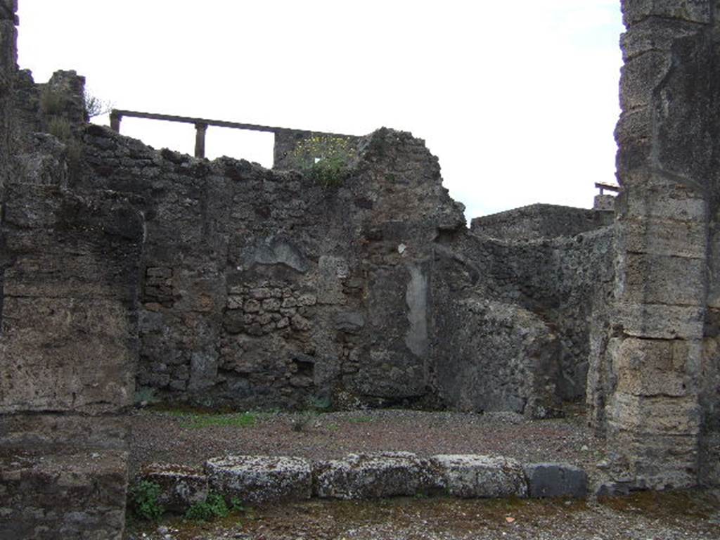 IX.8.a Pompeii. February 2020. 
Looking east from doorway towards lararium. Photo courtesy of Aude Durand.
