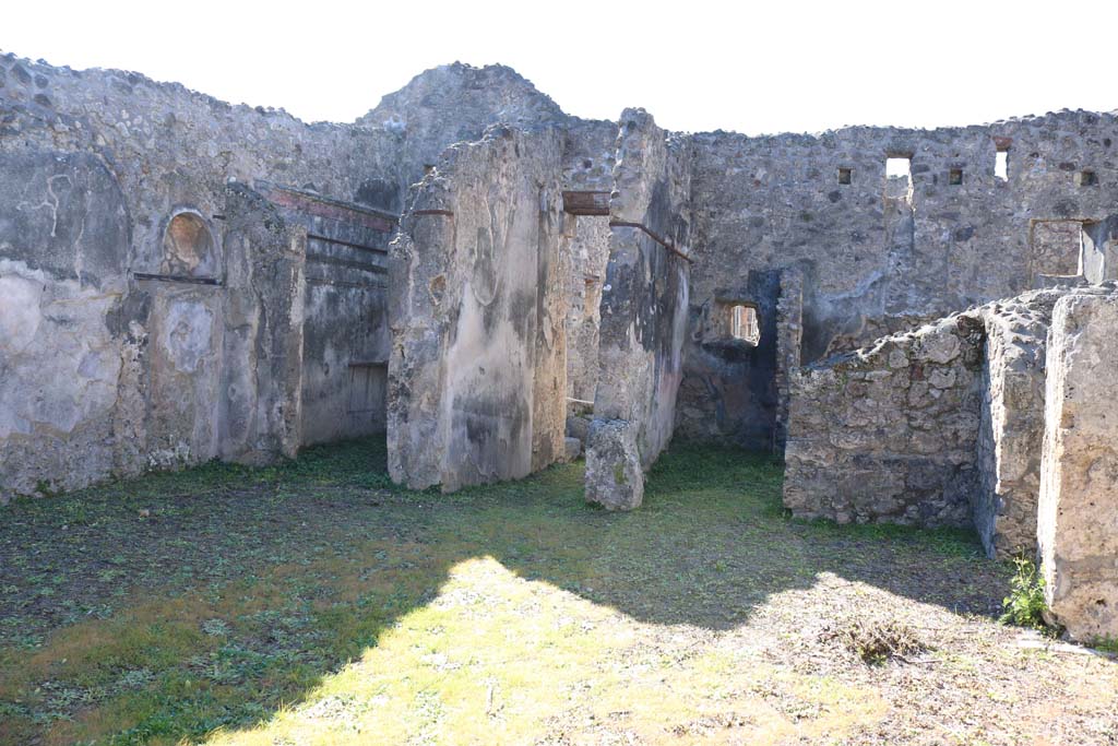 IX.8.b Pompeii. February 2020. Lararium niche set into south wall of atrium. Photo courtesy of Aude Durand.
According to Boyce, this large arched niche (h.0.60, w.0.78, d.0.30, h. above floor 1.90) had its inside walls decorated with a painted pattern representing blocks of coloured marble. The report in the Not. Scavi, called it “la nicchia dei Penati”.
See Notizie degli Scavi di Antichità, 1880, p. 185.
See Boyce G. K., 1937. Corpus of the Lararia of Pompeii. Rome: MAAR 14. (p.90, no.451) 


