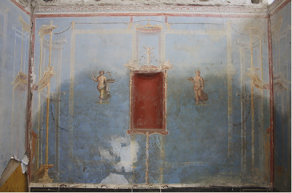 IX.12.6 Pompeii. May 2010. Room 6, west wall with lararium painting, from doorway at IX.12.8.
