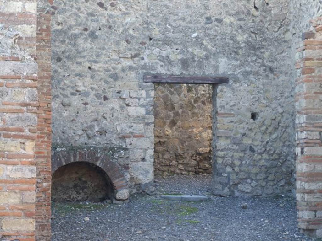 VI.7.23 Pompeii. July 2021. Looking towards east end of kitchen with lararium niche and altar. Photo courtesy of Johannes Eber.