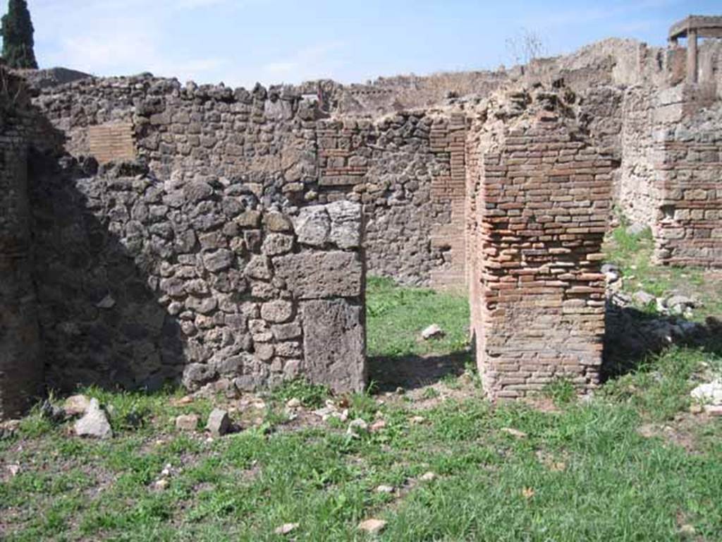 I.1.3 Pompeii. September 2010. Looking north to doorway leading to I.1.4, in north wall of entrance room. Photo courtesy of Drew Baker.
