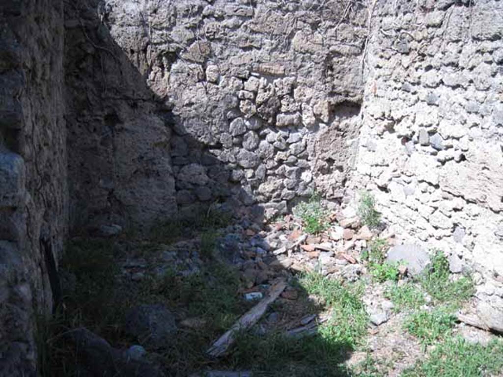 I.1.3 Pompeii. September 2010. Looking north in small room on north-west corner of yard area. Photo courtesy of Drew Baker.
