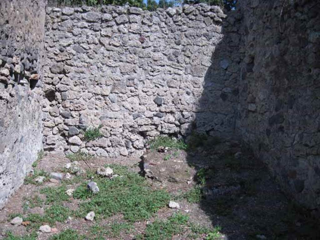 I.1.3 Pompeii. September 2010. East wall of room, with base of steps to upper floor in south-east corner?  Photo courtesy of Drew Baker.

