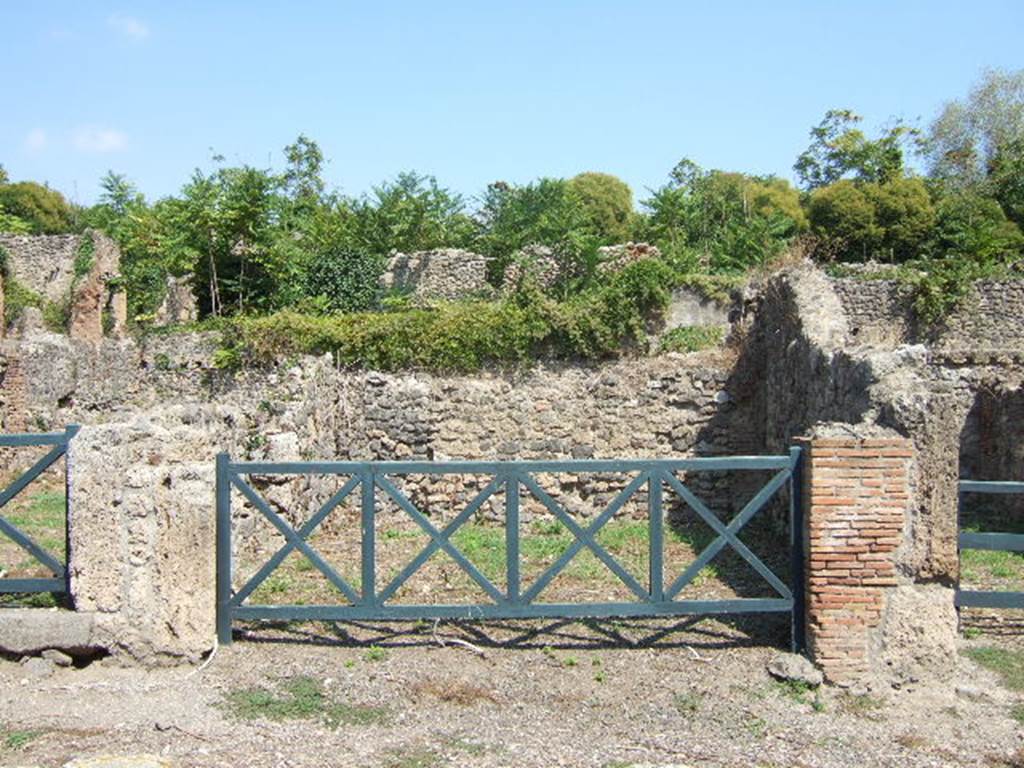 I.1.6 Pompeii. September 2005.  Entrance to shop, linked to another inn at I.1.8.
See - Packer, Jim, Inns at Pompeii: a short survey. In Cronache Pompeiane, IV, 1978, (p.6-9).
