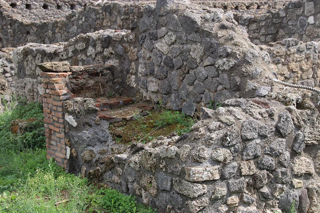 I.1.8 Pompeii. October 2024. Looking south-east towards hearth. Photo courtesy of Klaus Heese.