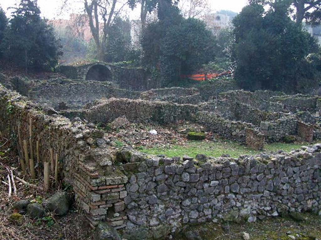 I.1.8 Pompeii. December 2006. Rear of hospitium, looking south across I.1.9 towards Stabian Gate, from Vicolo del Conciapelle.