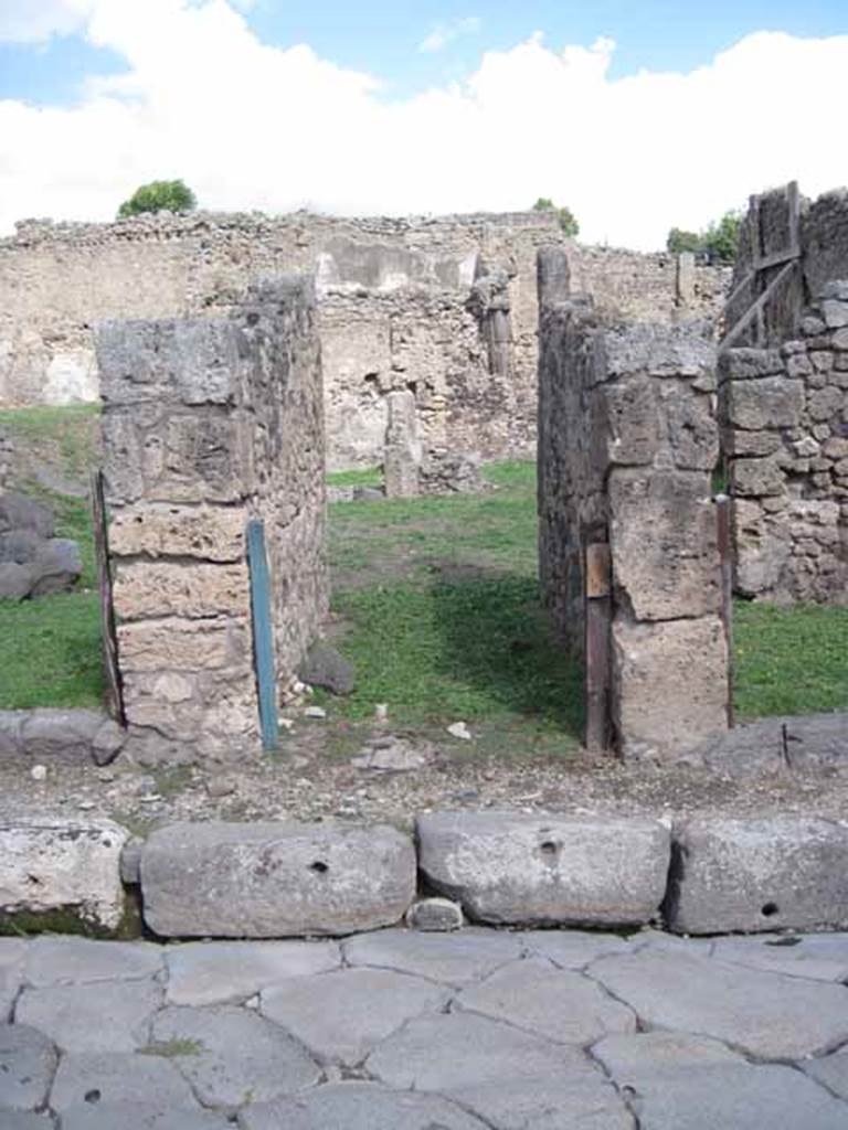 1.2.3 Pompeii. September 2010. Entrance doorway, looking east from Via Stabiana. Photo courtesy of Drew Baker.
