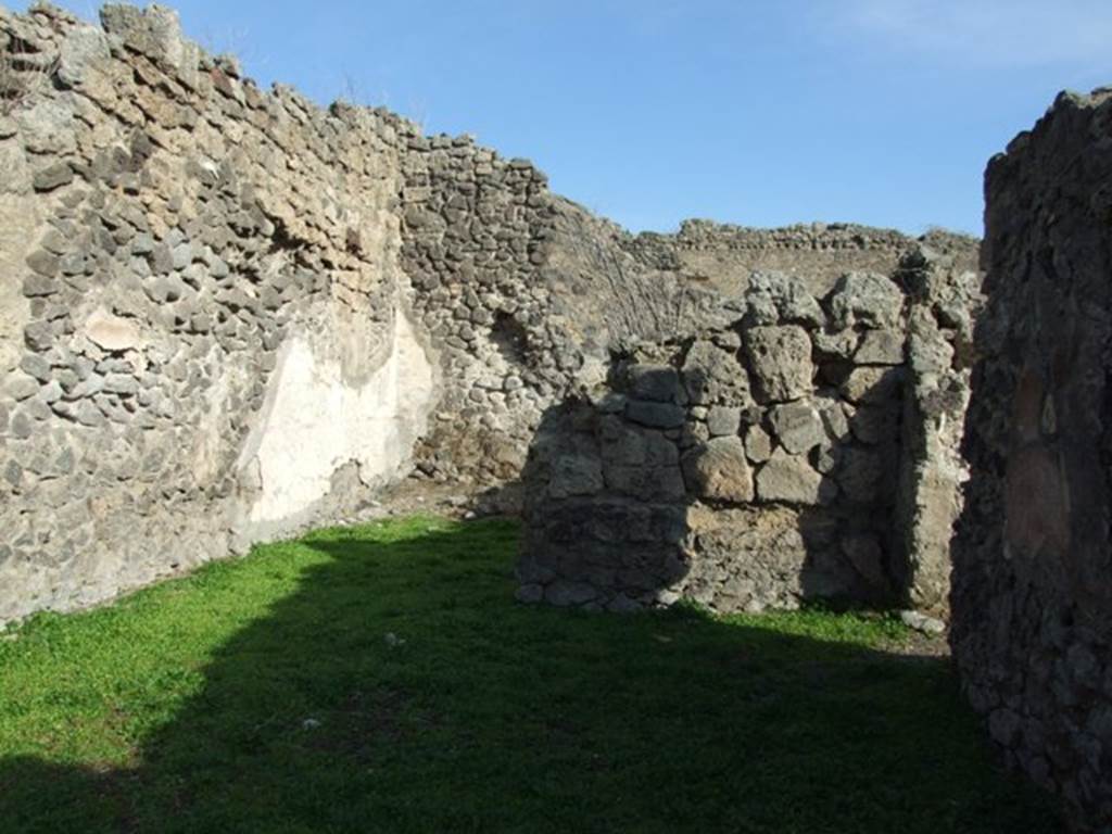 I.2.7 Pompeii.  December 2007. Looking east to rear room.  On the north wall of the rear room would have been a wooden staircase to the upper floor.
