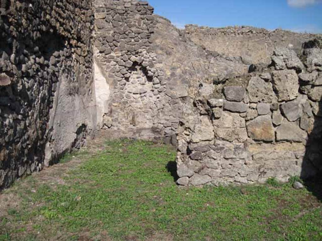 I.2.7 Pompeii. September 2010. Looking east from entrance, towards rear room.Photo courtesy of Drew Baker.