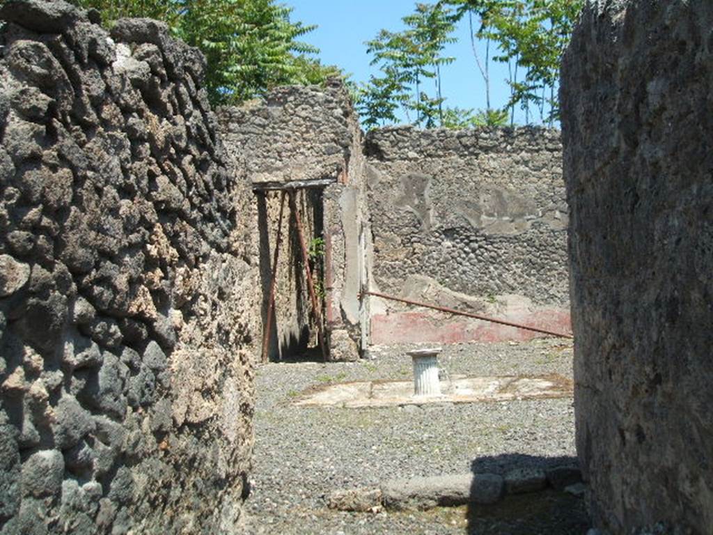 I.2.10 Pompeii. May 2005. Looking east across north side of atrium from entrance.