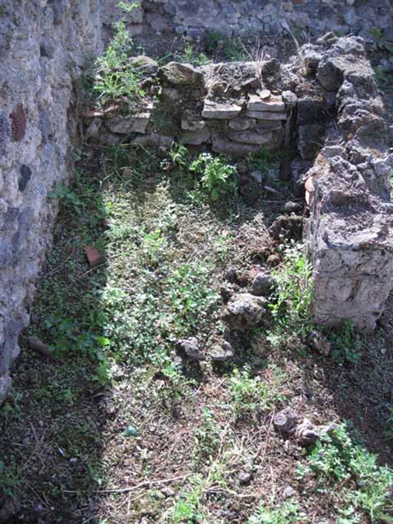 I.2.17 Pompeii. September 2010. Room 11, looking west to small area under the stairs to upper floor. Photo courtesy of Drew Baker.
