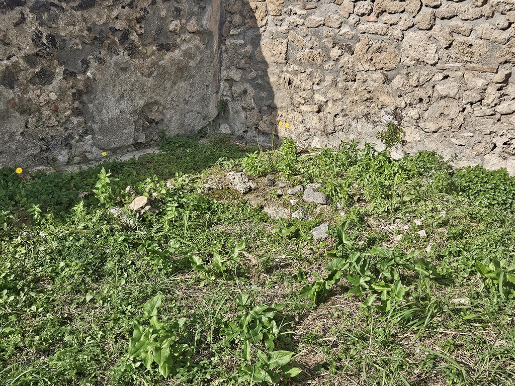 I.2.20 Pompeii. November 2024. 
North-west corner of garden area with remains of two-sided biclinium. Photo courtesy of Annette Haug.
