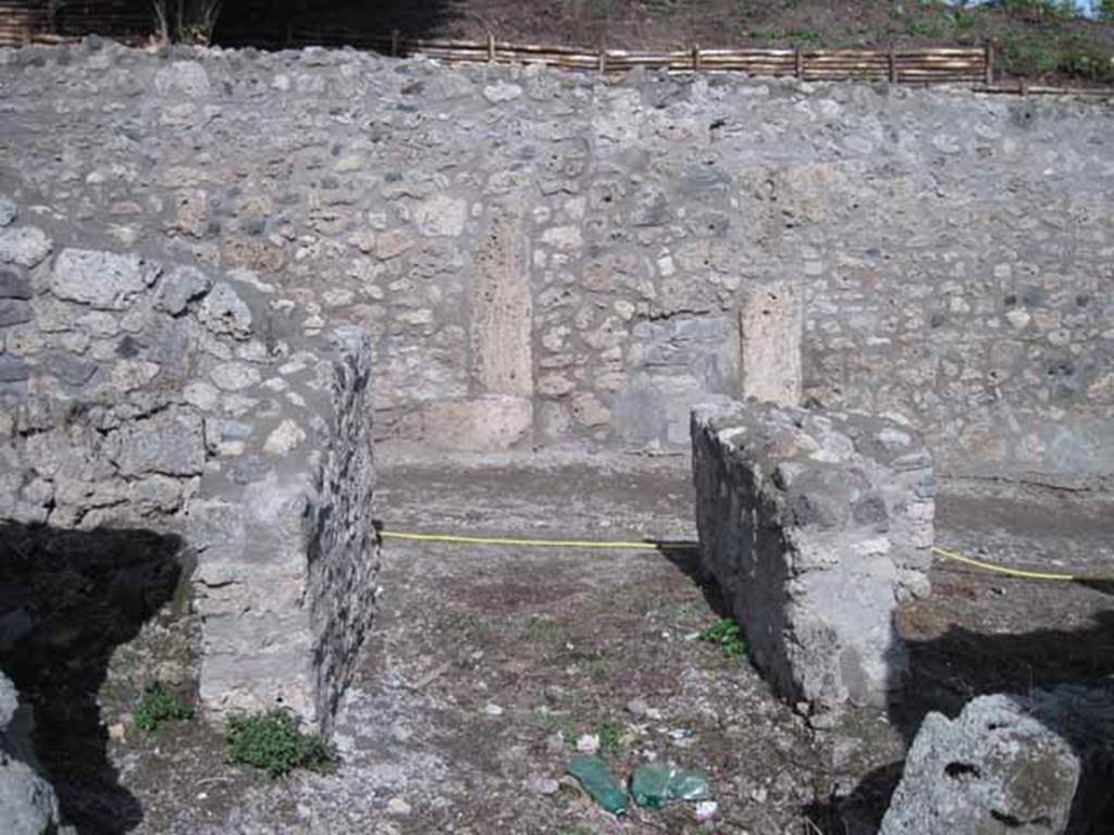 I.2.20 Pompeii. September 2010. Entrance doorway, looking east. Looking towards entrance doorway, and out onto Vicolo del Citarista. Photo courtesy of Drew Baker.

