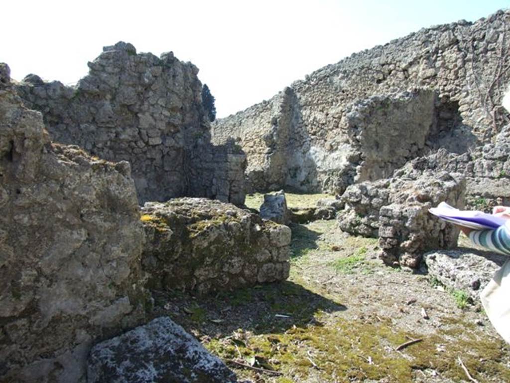 I.2.21 Pompeii.  March 2009.  Looking north west through entrance into Thermopolium, with I.2.20 at the rear.