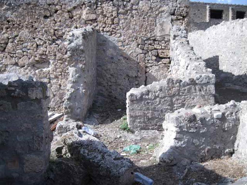 I.2.21 Pompeii. September 2010.  Looking north from bar, across entrance corridor of I.2.20 to small room on north side. Photo courtesy of Drew Baker.
