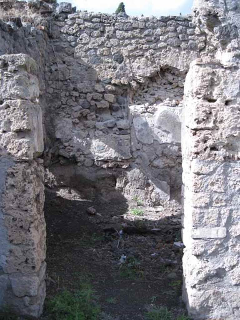 I.2.22 Pompeii. September 2010. Doorway to room 4, triclinium, in north wall of shop. Photo courtesy of Drew Baker. This is the room that Warscher described as a cubiculum.
