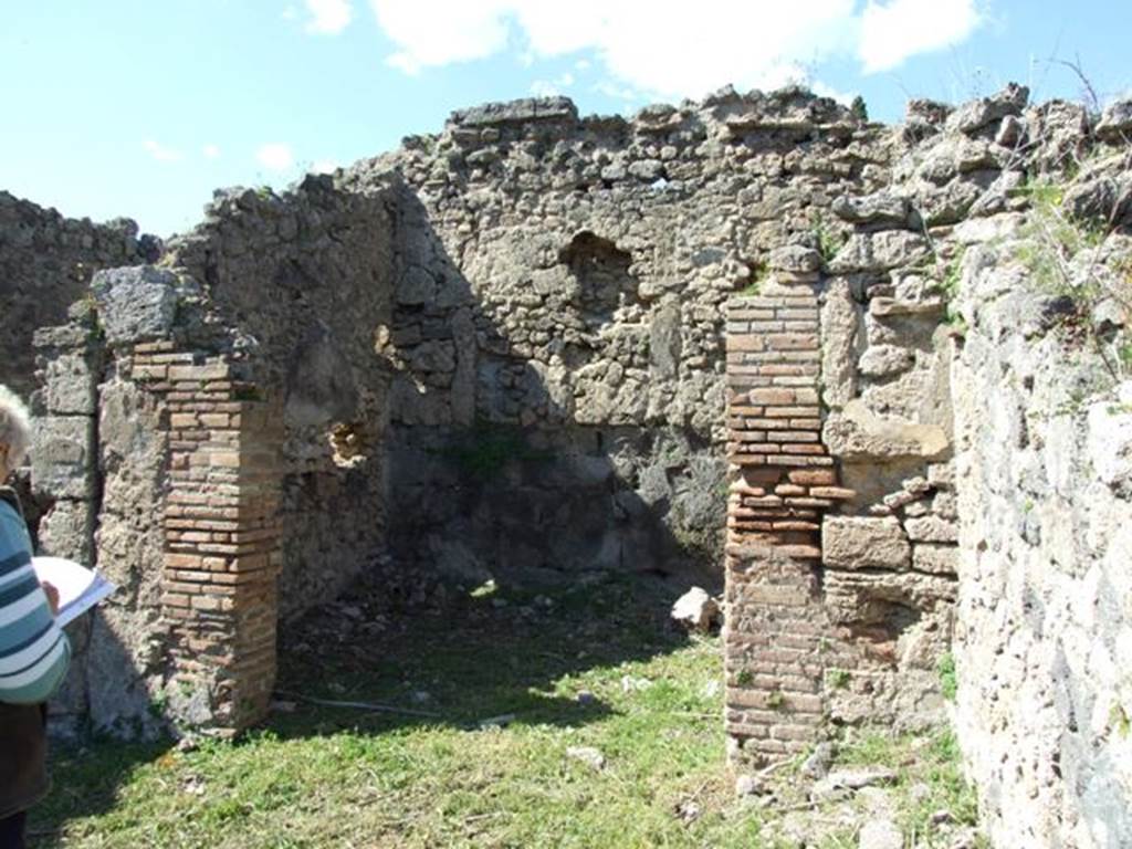 I.2.22 Pompeii.  March 2009.  Room 6, in north east corner of open garden area.
According to Warscher, the north wall seemed to have been very old. Il muro nord sembra essere molto antico, giacche si vedono i gruppi delle pietre di lava, come per esempio nella stanza f (our room 6). Le pareti che separano le stanze f e g (rooms 6 and 7) dalla grande stanza e (room 5) sono di tufo. Nellepoca tarda queste pareti sono state ingrandite con mattoni.  (see picture 40 below).
See Warscher T., 1935. Codex Topographicus Pompeianus: Regio I.2. Rome: DAIR, whose copyright it remains.
