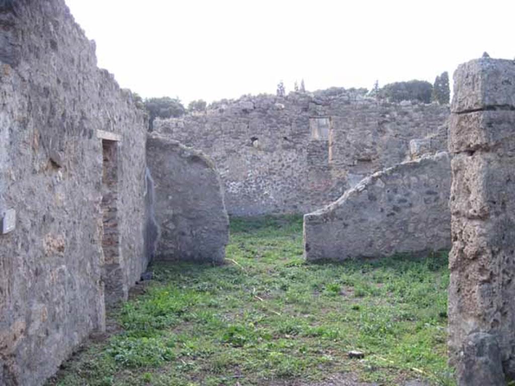 I.2.22 Pompeii. September 2010. Looking west to entrance doorway, area of shop, and area of garden. Photo courtesy of Drew Baker
