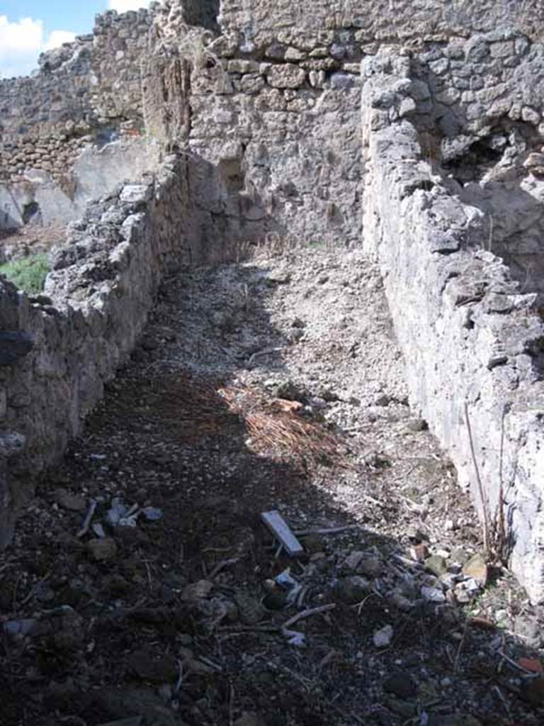 I.2.23 Pompeii. September 2010. Looking north into corridor, leading to kitchen area. Photo courtesy of Drew Baker.
