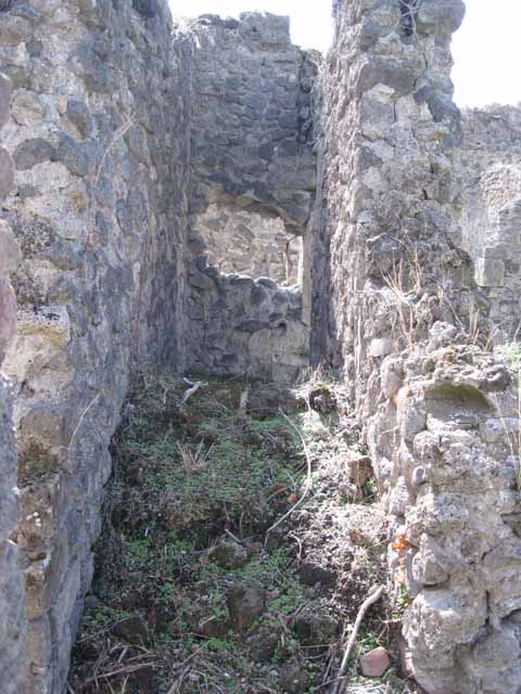 I.2.24 Pompeii. September 2010. Looking north through doorway of large room, into atrium. Photo courtesy of Drew Baker.
