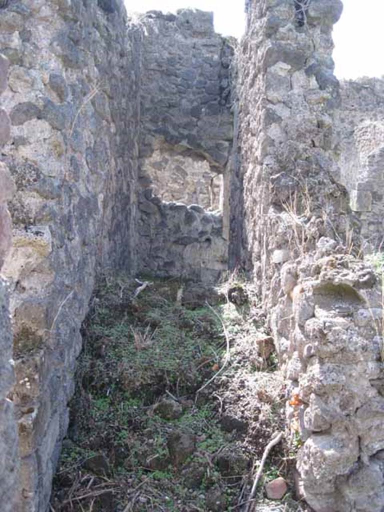 I.2.24 Pompeii. September 2010.  Looking west towards stairs between the doorway to the large room, on left, and atrium, on right. Photo courtesy of Drew Baker.
