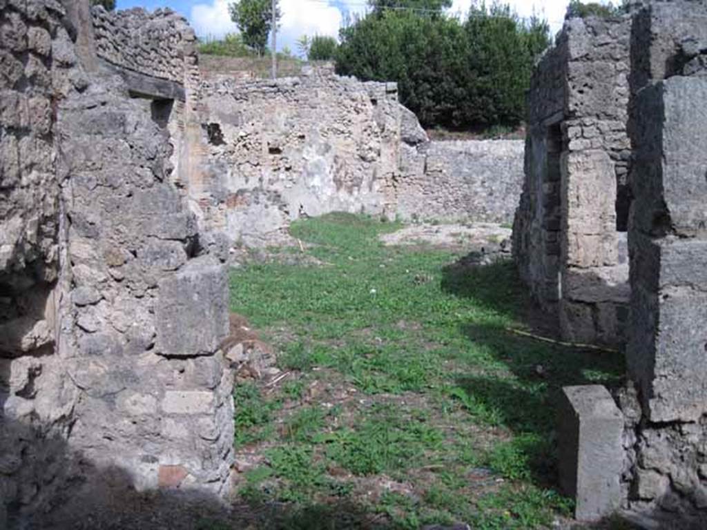 I.2.24 Pompeii. September 2010. Looking east from room in south-west corner of atrium, into atrium. Photo courtesy of Drew Baker.
