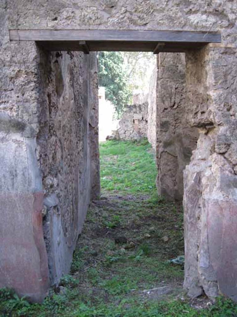 I.2.28 Pompeii. September 2010.  Looking south through doorway into cubiculum and through its doorway to atrium, from room on south side of triclinium. Photo courtesy of Drew Baker.
