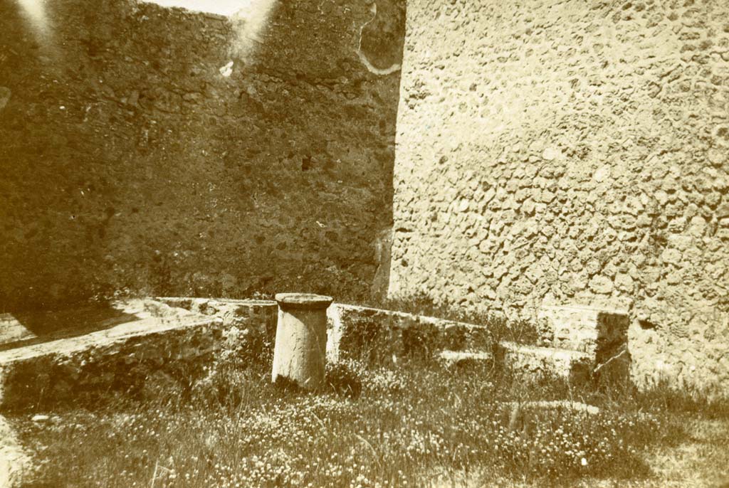 I.2.28 Pompeii. 1903. Looking west towards triclinium, and north-west corner.
Against the north wall was a small masonry podium, which, according to Jashemski, was reached by steps.
Photo by Esther Boise Van Deman  American Academy in Rome. VD_Archive_Ph_218.
Described as Triclinium and altar near Stabian Gate 1903.
See Jashemski, W. F., 1993. The Gardens of Pompeii, Volume II: Appendices. New York: Caratzas. (p.25)
