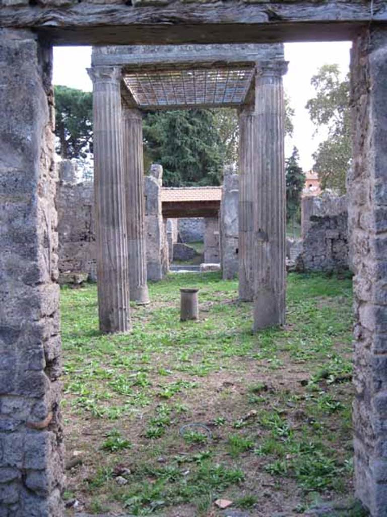 I.2.28 Pompeii. September 2010. Looking south through doorway, across tablinum to atrium and entrance doorway. Photo courtesy of Drew Baker.
