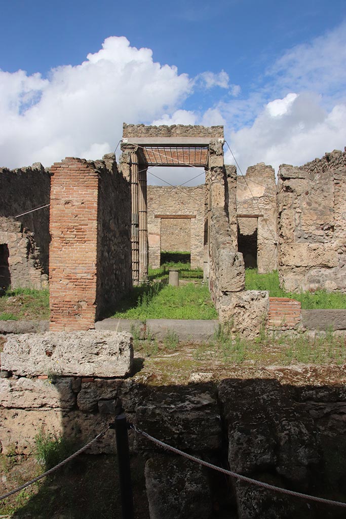 I.2.28 Pompeii. October 2024.
Looking north across Vicolo del Conciapelle towards entrance doorway. Photo courtesy of Klaus Heese.
